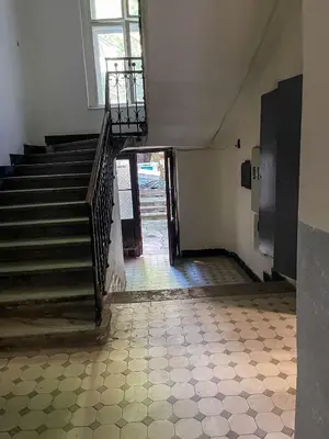 an empty room with stairs and a stair case at Downtown Heaven in Belgrade