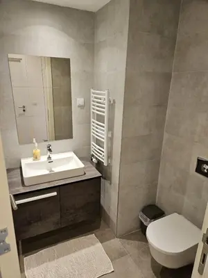 a bathroom with a sink and a toilet at Best Apartments-Aqua-Belgrade Waterfront in Belgrade