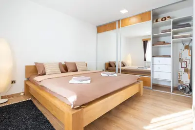 a bedroom with a large bed in a room at 1-Bedroom Apartment with Balcony in Ledine