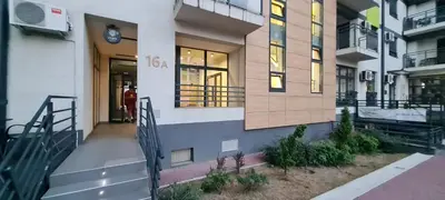a building with a clock on the side of it at Amar5 in Belgrade