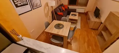 an overhead view of a small apartment with a table and chairs at Amar5 in Belgrade