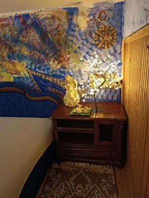 a room with a table with a wall with a map at Maravilja in Filmski Grad