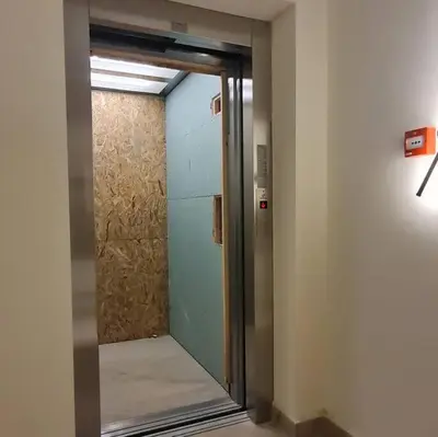 a glass door to a shower in a room at Amar 4 in Zemun