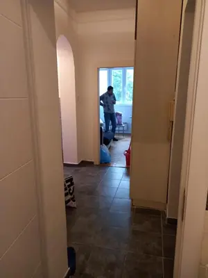a man standing in the hallway of a house at Sofija 1 in Vračar (historical)