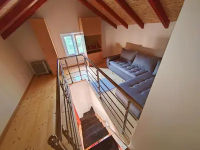 an overhead view of a living room with a couch at Dadula na Dunavu in Kovin