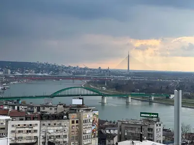 a view of a bridge over a river with buildings at Central Sky View Apartment in Belgrade