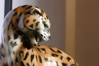 a statue of a dalmatian dog sitting on top at Comfortable and spacious apartment in one of Belgrade’s most exclusive neighbourhoods in Belgrade