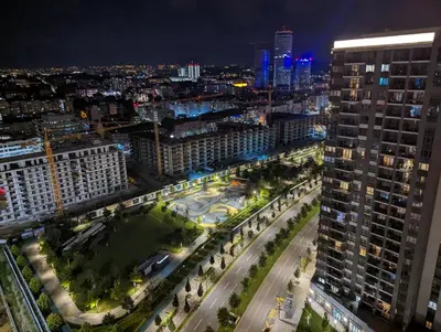 an aerial view of a city at night at Luxury Belgrade Waterfront top floor Apt with an amazing view in Belgrade