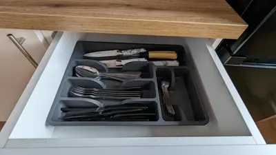 a drawer in a kitchen with utensils in it at Temple saint sava in Dušanovac (historical)