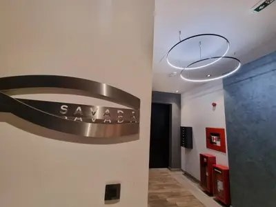 a lobby with a sara sign on the wall at Urban studio in Bežanija