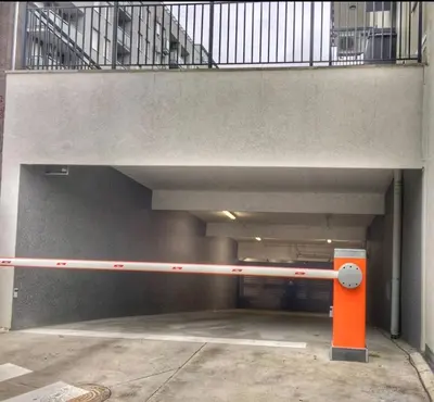 an empty parking lot with a staircase in a building at Urban studio in Bežanija