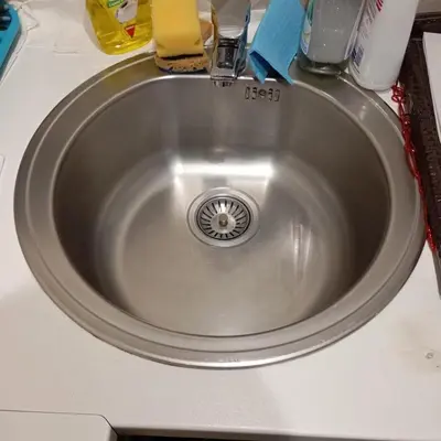 a silver sink with a faucet on a counter at Belgrade apartment deluxe in Belgrade