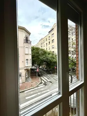 a window with a view of a city street at Apartment Delic in Belgrade