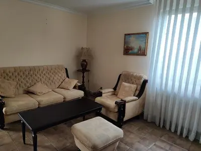 a living room with a couch and two chairs at Big Borak in Veliki Borak