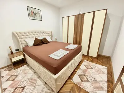 a bedroom with a large bed in a room at Square 29 in Belgrade