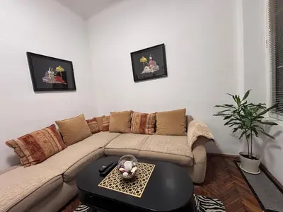 a living room with a couch and a table at Square 29 in Belgrade