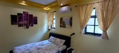 a bedroom with a bed and a window at Hostel Ruler in Belgrade