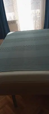 a mattress on a bed frame in a room at Airport MD rooms in Belgrade