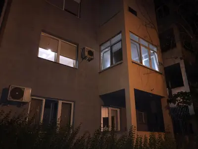 a building with windows on the side of it at night at Martina Lux in Belgrade
