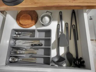a drawer in a kitchen filled with utensils at Vukov spomenik in Belgrade