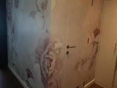 a bathroom with a shower with a wall at Emily apartment in Belgrade