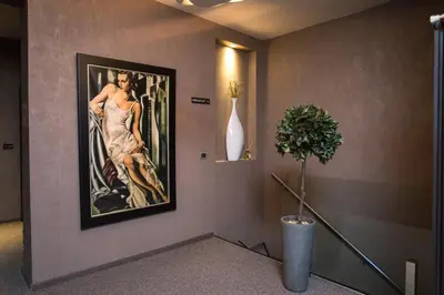 a painting of a woman on a wall at Prince Hall in Belgrade