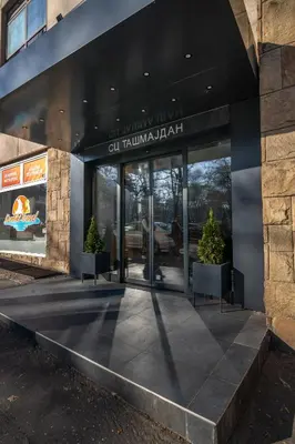 a building with the entrance to a restaurant at City Joy - sports Center Tasmajdan in Belgrade