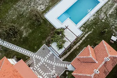 an aerial view of a house with a swimming pool at Uzivancija in Lazarevac