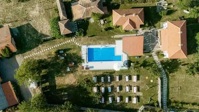 an overhead view of a house with a swimming pool at Uzivancija in Lazarevac