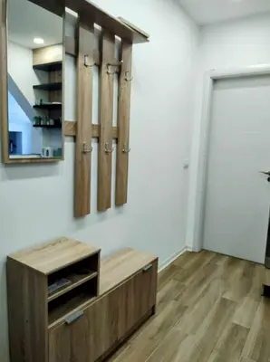 a room with a counter and a mirror on the wall at Studio Bajka in Kanarevo Brdo