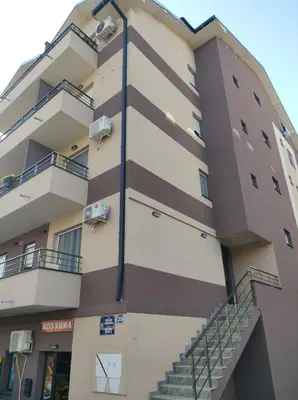a building with stairs on the side of it at Studio Bajka in Kanarevo Brdo