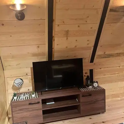 a large entertainment center with a flat screen tv at Apartman Durtanoski in Belgrade