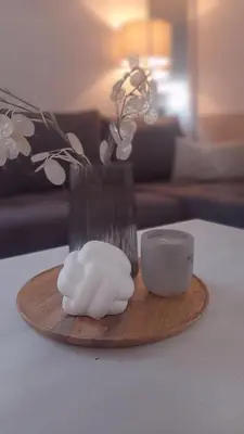 a wooden tray with a vase and a cup on a table at Green Oasis 30 km from downtown Belgrade in Gaglovo