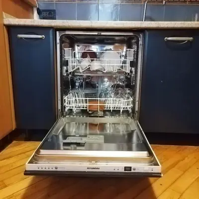 a dishwasher with its door open in a kitchen at Dream 2 in Belgrade