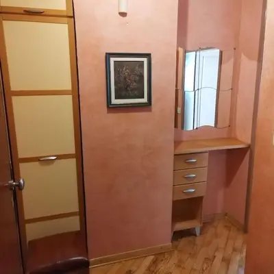 a room with a closet with a mirror and a door at Dream 2 in Belgrade