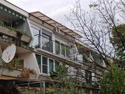 an external view of a building with windows at Royal apartment Sava river Blok 70 in Ada Ciganlija