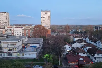 a view of a city with tall buildings at Apartman Meri in Tošin Bunar
