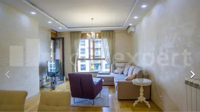 a living room with a couch and a tv at Central Garden modern 1 bedroom condominium complex in Belgrade