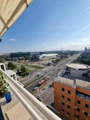 a view of a city from the balcony of a building at Ušće apartman in Novi Beograd