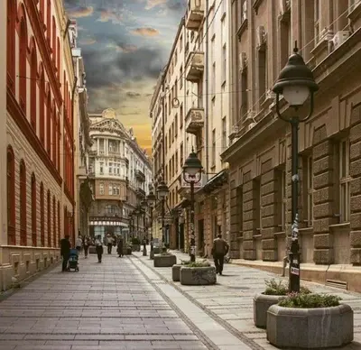 a city street with buildings and people walking down the street at Apartment Knez Belgrade in Belgrade