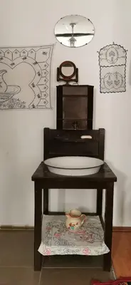 a bathroom with a sink on a table at Etno domaćinstvo Miris Bosiljka in Mislođin