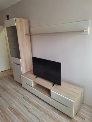 a flat screen tv sitting in a living room at Sarajevska Beograd in Sajmište