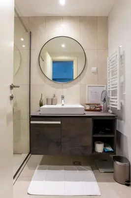 a bathroom with a sink and a mirror at The View Belgrade Waterfront in Belgrade