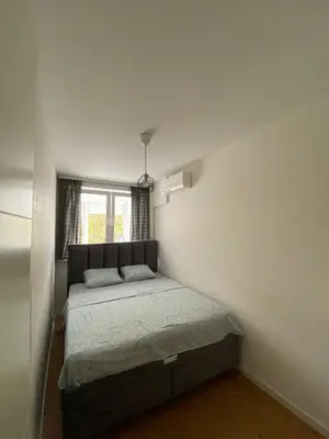 a bedroom with a bed and a window at Goce 20 New Belgrade,near hotel Jugoslavija in Tošin Bunar