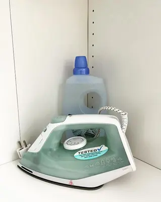a toaster with a bottle on top of it at GreenCity10 in Belgrade