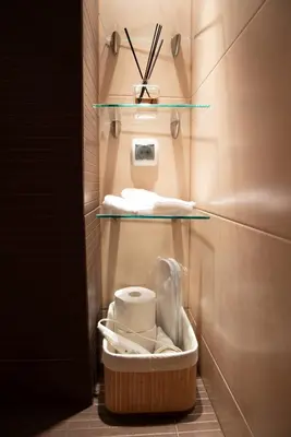 a small bathroom with a toilet in a room at Sweet House Parlament Lux in Belgrade