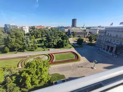 a view of a city with a park and buildings at Sweet House Parlament Lux in Belgrade