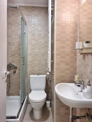 a bathroom with a toilet and a sink at Antik Apartman in Stara Pazova