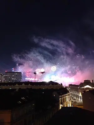 a night view of a city with fireworks in the sky at Belgrade River view 1 in Belgrade