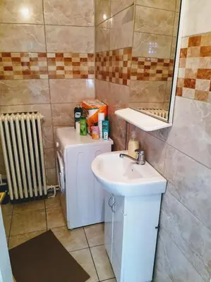 a bathroom with a sink and a mirror at Belgrade River view 1 in Belgrade